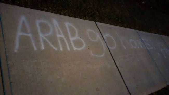Arab go home graffiti